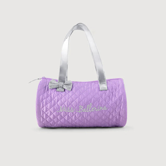 Purple quilted handbag with silver handle on a light gray background